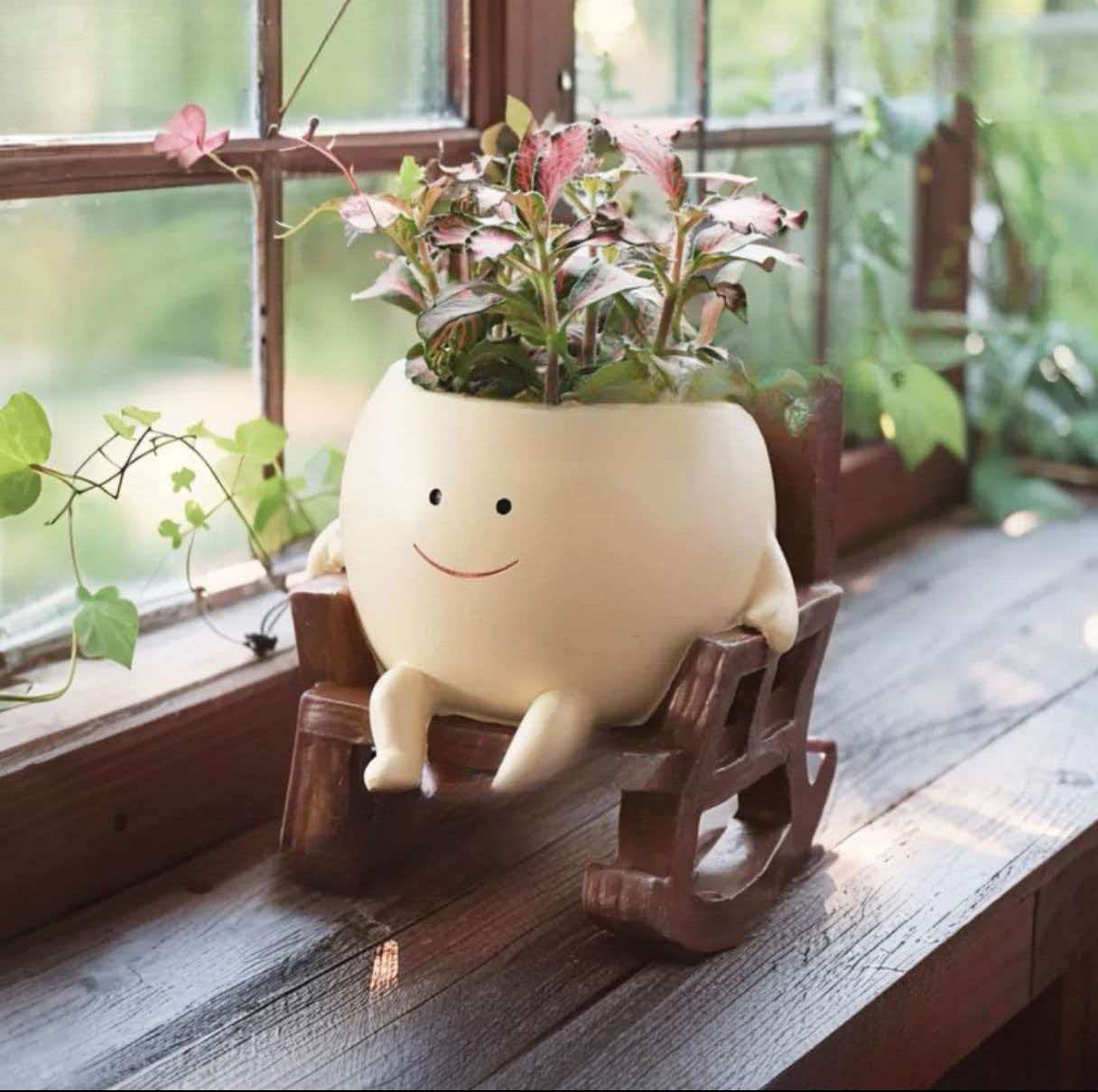Rocking Smiley Face Planter