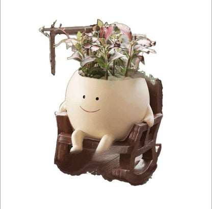 Rocking Smiley Face Planter